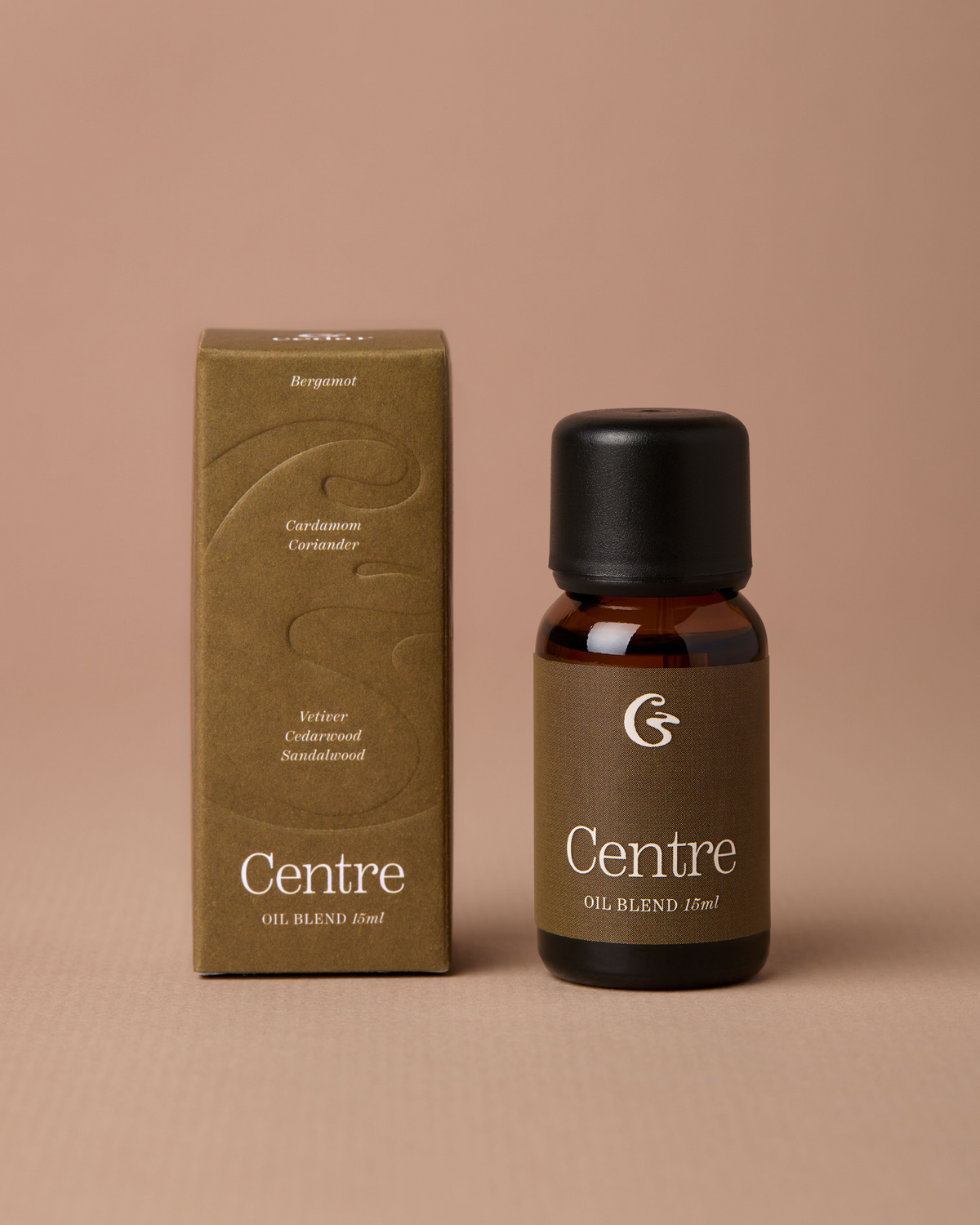 Centre 15ml oil blend in an amber bottle with a matching box.