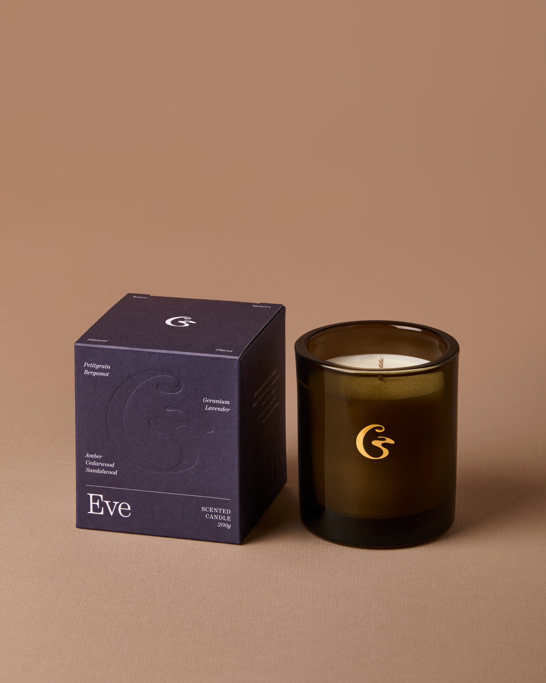 Dark glass candle with a matching &