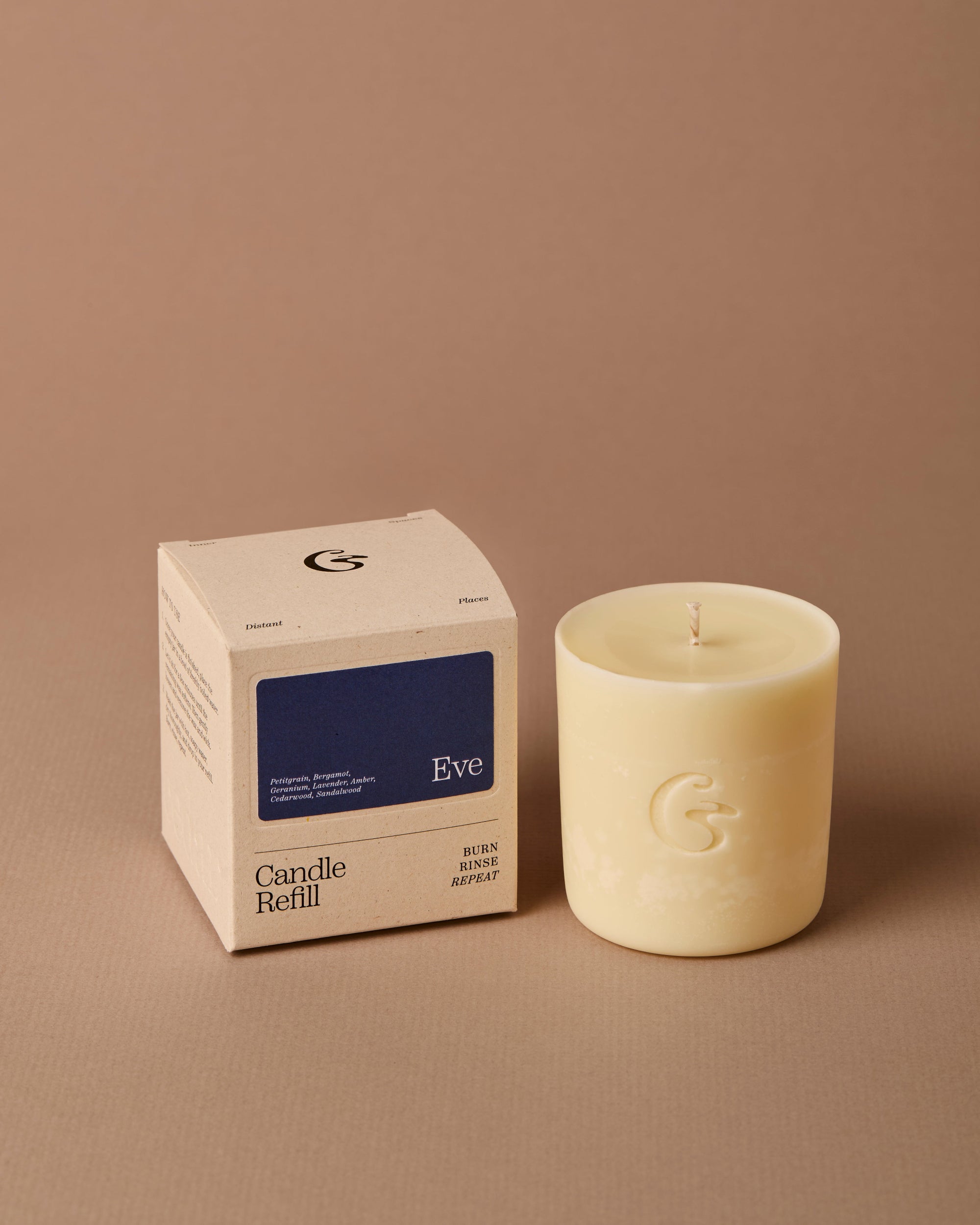 Eve candle refill sat next to a box