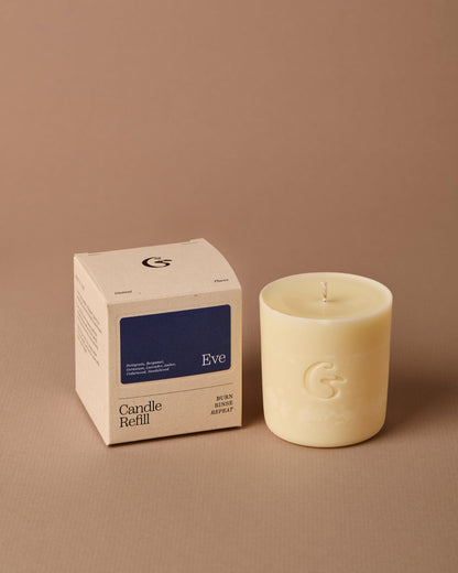 Eve candle refill sat next to a box