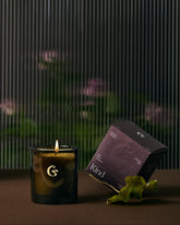 Candle with a decorative box with the name &