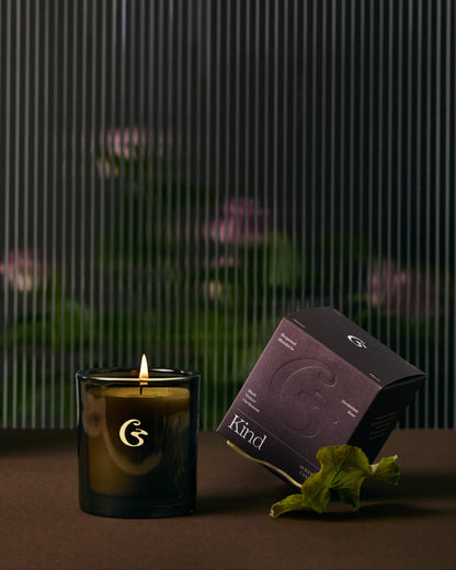 Candle with a decorative box with the name &